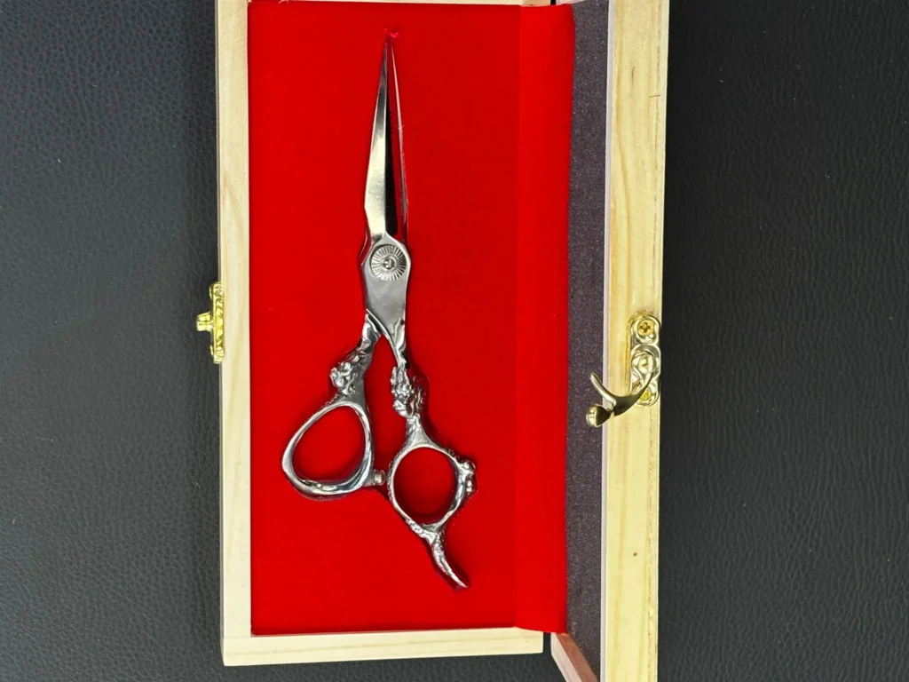 Premium stainless steel professional hair cutting scissors by Straight 8 Barbershop.